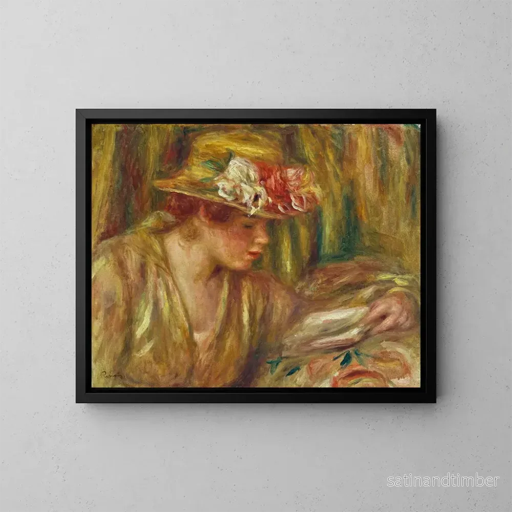 Reproduktion av målningen av en kvinnobyst i hatt som läser med huvudet vänd åt höger - Pierre-Auguste Renoir